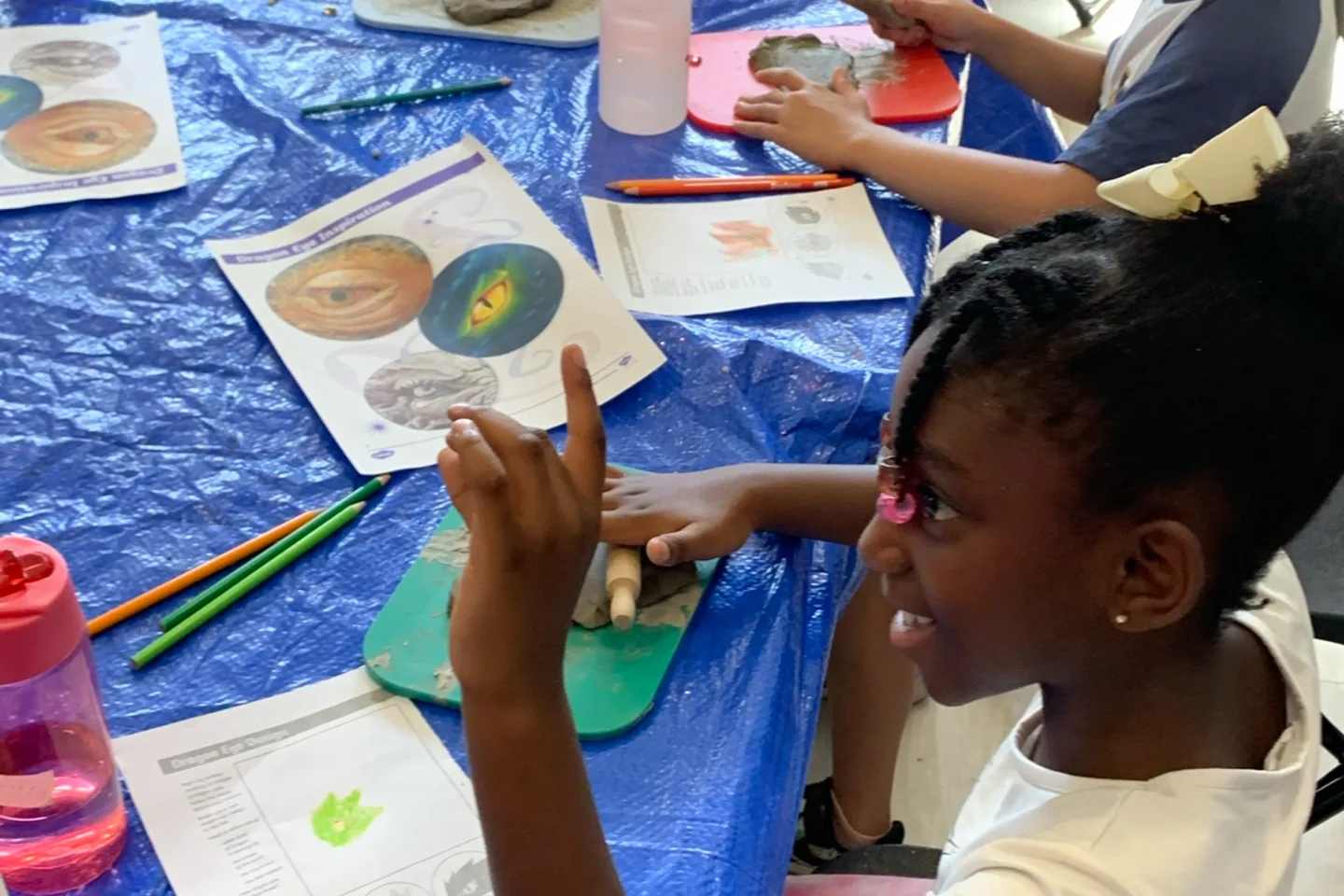 Children taking part in a creative activity